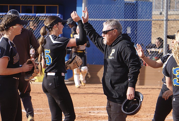 Prescott softball head coach Randall Bryan celebrates with his team during the middle of inning in a game against Saguaro on Wednesday, March 8, 2023, in Prescott. (Aaron Valdez/Courier)