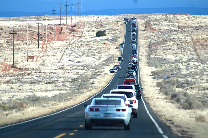 A 100-mile motorcade procession for the funeral of former Navajo Nation President Peterson Zah was led by the Navajo Nation Police Department March 11. (Darren Thompson/Native News Online)