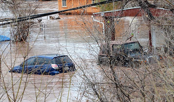 Property owners on Bates Road in Cottonwood were met with Verde River flood waters Thursday morning, March 16, 2023. (VVN/Vyto Starinskas)
