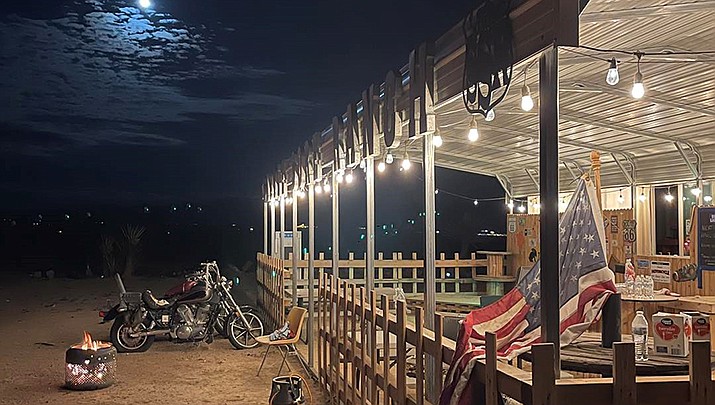 Building with a porch serves as an informal headquarters of sorts for the Saddle Sore Ranch that is hosting a St. Fatty's Day cannabis culture celebration this weekend. (Photo by Dave Hawkins/For the Miner)