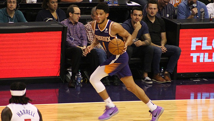Devin Booker scored 19 points to lead the Phoenix Suns to a 116-113 win over the Orlando Magic in Phoenix on Thursday, March 15. (Miner file photo)