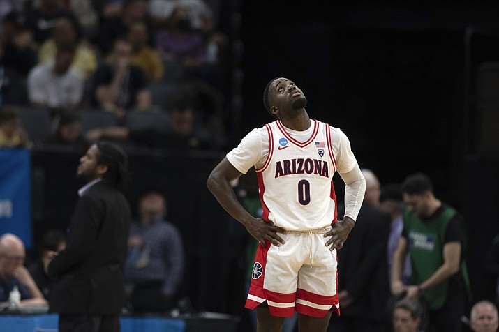 Arizona guard Courtney Ramey (0) looks up at the scoreboard during the second half of a first-round game against Princeton in the NCAA Tournament in Sacramento, Calif., Thursday, March 16, 2023. Princeton won 59-55. (José Luis Villegas/AP)