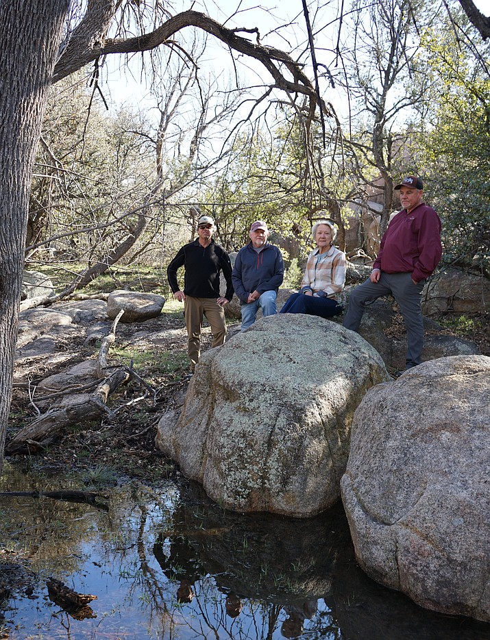 On Friday, March 17, 2023, Rebecca Ruffner, second from right, daughter of longtime Prescott historian and community advocate Elisabeth Ruffner, visited No Name Creek along with Prescott Trails and Natural Parklands Coordinator Chris Hosking, left, Dick Hanna of the Central Arizona Land Trust, and Prescott Recreation Services Director Joe Baynes, right. (Cindy Barks/Courier)