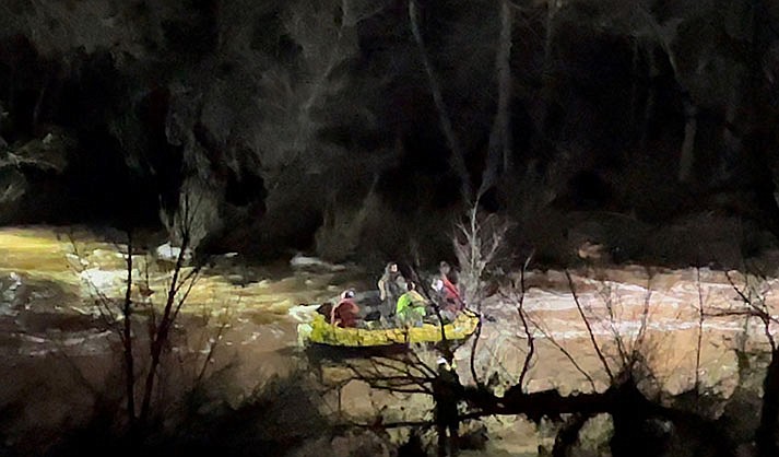Verde Valley Fire District swift water rescuers pulled four people and two dogs off a water-swamped vehicle in Oak Creek at Mormon Crossing. (VVFD)