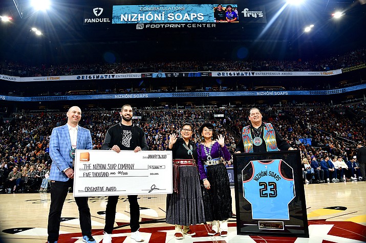 As the recipient of the ORIGINATIV Entrepreneur Award, Nizhóní Soaps received a $5,000 grant from FirstBank and was recognized on-court at a Suns home game February 27. (Photo/Originativ)