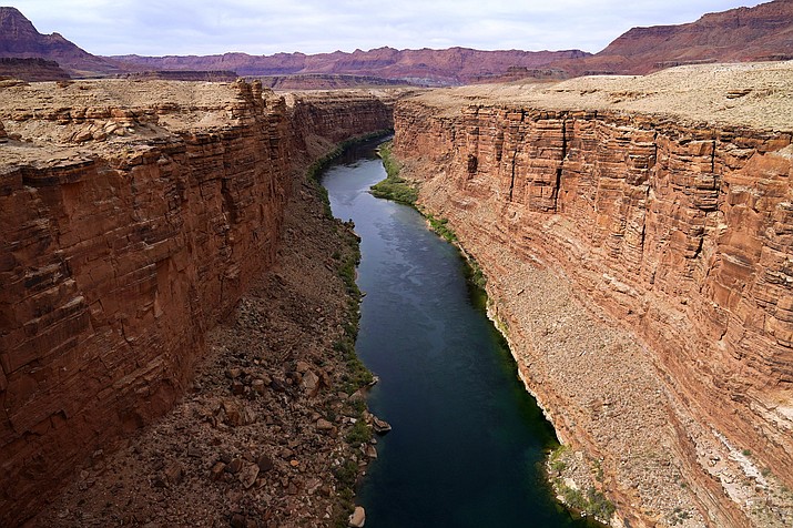 The Colorado River in the upper River Basin is pictured in Lees Ferry, Ariz., on May 29, 2021. The Supreme Court appears to be split in a dispute between the federal government and the Navajo Nation over water from the drought-stricken Colorado River. The high court heard arguments Monday, March 20, 2023, in a case that states argue could upend how water is shared in the Western U.S. if the court sides with the tribe. (Ross D. Franklin/AP, File)