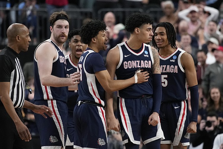 Gonzaga players celebrate during the final seconds in the second half of a Sweet 16 game against UCLA in the West Regional of the NCAA Tournament, Thursday, March 23, 2023, in Las Vegas. (John Locher/AP)