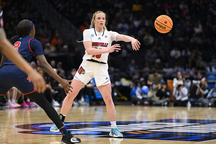 Louisville guard Hailey Van Lith (10) passes the basketball during the second quarter of the team's Sweet 16 game against Mississippi in the women's NCAA Tournament in Seattle, Friday, March 24, 2023. (Caean Couto/AP)