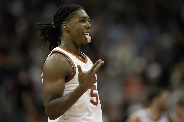 Texas guard Marcus Carr celebrates after scoring against Xavier in the first half of a Sweet 16 game in the Midwest Regional of the NCAA Tournament Friday, March 24, 2023, in Kansas City, Mo. (Charlie Riedel/AP)