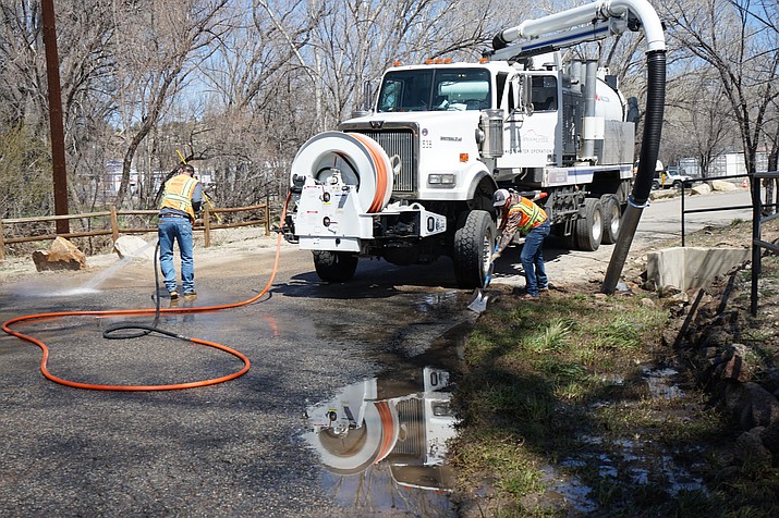 Crews with the City of Prescott’s Wastewater Treatment Division continued work in Granite Creek Park in downtown Prescott on Monday, March 27, 2023 to clean up the sewage overflow that occurred into Granite Creek during heavy rainfall on March 21, 22, and 23, 2023. (Cindy Barks/Courier)
