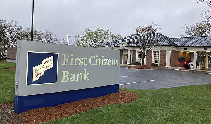 A First Citizens Bank sign is seen in Durham, North Carolina, on Monday March 27, 2023. (AP Photo/Jonathan Drew)