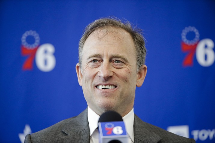 Philadelphia 76ers owner Josh Harris speaks with members of the media during a news conference at the team's practice facility in Camden, N.J., Tuesday, May 14, 2019. Two people with knowledge of the situation tells The Associated Press a group led by Josh Harris and Mitchell Rales has submitted a fully financed bid for the NFL's Washington Commanders. The Harris/Rales group, which includes basketball Hall of Famer Magic Johnson, is one of multiple bidders involved in the sale process. (Matt Rourke/AP, File)