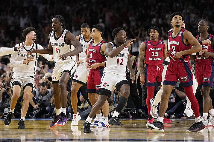 San Diego State celebrates after their win against Florida Atlantic in a Final Four college basketball game in the NCAA Tournament on Saturday, April 1, 2023, in Houston. (Brynn Anderson/AP)