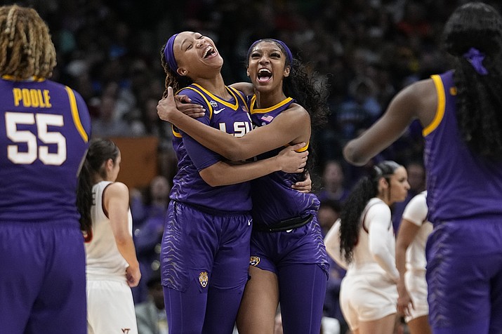 LSU’s Angel Reese and LaDazhia Williams react during the second half of an NCAA Women’s Final Four game against Virginia TechFriday, March 31, 2023, in Dallas. (Tony Gutierrez/AP)