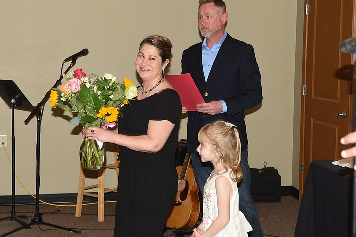 Lorette Stewart, the outgoing Chamber president and CEO, center, was recognized for her work at the Chino Valley Chamber of Commerce Awards Ceremony on Friday, March 31, 2023. (Jesse Bertel/Review)