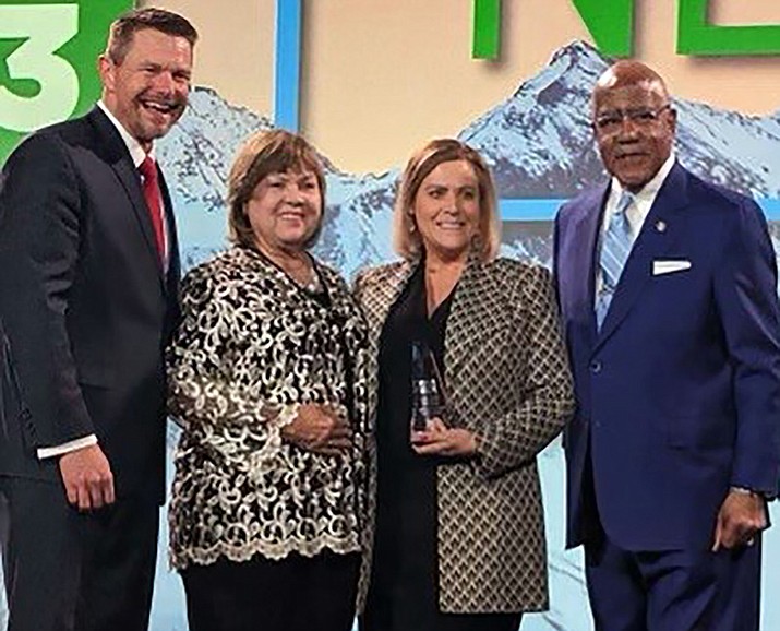 The American Association of Community Colleges (AACC) has named Ms. Deb McCasland, second from left, its National Trustee of the Year. (Courtesy)