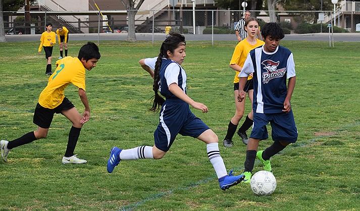 Yannely Santana kicking the ball up the field (VVN/ Paige Daniels)