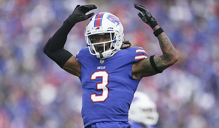 Buffalo Bills safety Damar Hamlin reacts after a play during the first half of the team's NFL football game against the Pittsburgh Steelers on Oct. 9, 2022, in Orchard Park, Hamlin has been cleared to resume playing and is attending the team’s voluntary workout program some four months after going into cardiac arrest and having to be resuscitated on the field during a game at Cincinnati, general manager Brandon Beane said Tuesday, April 18, 2023. (AP Photo/Joshua Bessex, File)