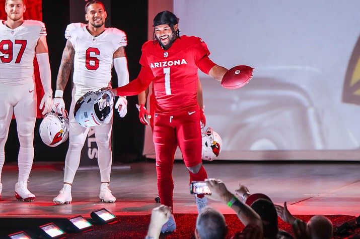 Quarterback Kyler Murray drew applause when he was introduced and showed off the team’s all-red look. An injury has Murray’s status for 2023 up in the air. (Photo by Reece Andrews/Cronkite News)