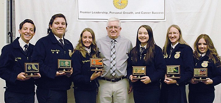 Shown here are the current officers of the Arizona Agribusiness & Equine Center chapter of the Future Farmers of America: President, Claire Poppenberger; vice president, Jasmine Wight; secretary, Madie Kunisch; treasurer, Parker Pruhs; reporter, Sahalie Maurer and Sentinel, Tyler Vallely. (AAEC FFA chapter/Courtesy)