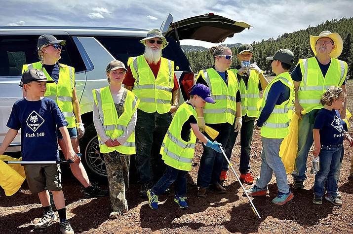 The Williams Cub Scouts and Williams Lion Club teamed up to pick up trash at the West end of Route 66 on Earth Day, April 22.