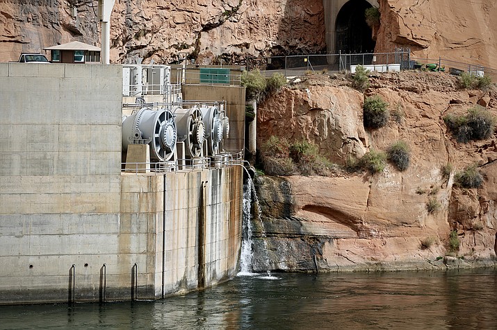 The Bureau of Reclamation is running a “high-flow experiment” at Glen Canyon Dam in northern Arizona, which means a big release of water designed to move and redeposit sand and sediment will make its way downstream from the dam. (Photo/KUNC)