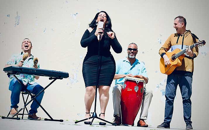 Sofrito & the Blues’ quartet is comprised of, from left, César Orozco (keyboards), Carmen Elisa Cancél (singer), Jainardo Batista (percussion) and Juancho Herrera (guitar). (Courtesy photo)