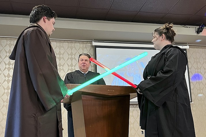 Julia and Robert Jones exchange vows during their wedding ceremony in Akron, Ohio, on Thursday, May 4, 2023. Couples celebrated May the Fourth with a “Star Wars” themed wedding. (Patrick Orsagos/AP)