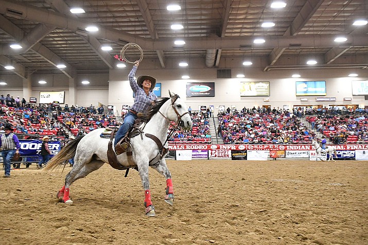 Bailey Bates does a  victory lap after with the Breakaway Roping at the Indian National Finals Rodeo in 2019 (Photo/INFR)