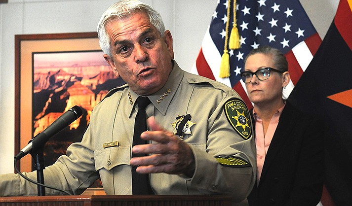 Pima County Sheriff Chris Nanos lashes out Monday at the federal government for failing to deliver on its responsibilities for dealing with the border and immigration. Nanos was speaking at a press conference organized by Gov. Katie Hobbs. (Capitol Media Services photo by Howard Fischer)