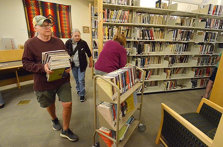 People turn out to the Verde Valley Campus Library in Clarkdale for its Free Books event on Wednesday, May 10, 2023. (VVN/Vyto Starinskas)