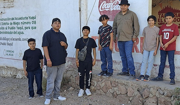 Members of the Pascua Yaqui Tribe pose for a photo in their tribal community in Sonora, Mexico. in March, 2023. (Raymond V. Buelna via AP)