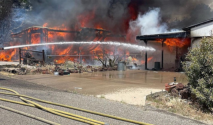 A fire spread to homes and vehicles in a neighborhood near Cottonwood May 13, 2023. (VVFD photo)