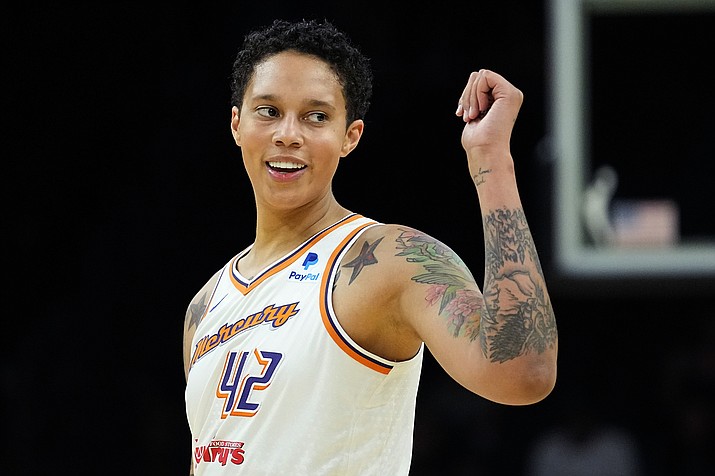 Phoenix Mercury center Brittney Griner smiles during the first half of a preseason game against the Los Angeles Sparks, Friday, May 12, 2023, in Phoenix. (Matt York/AP)