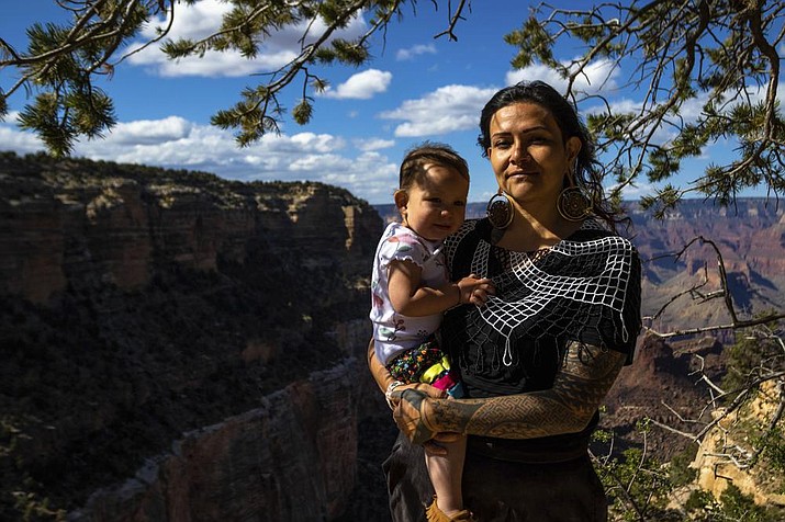 Havasupai tribal member Ophelia Watahomigie-Corliss stands with her daughter at the South Rim. (Ty O'Neil/Associated Press)