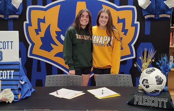Prescott’s Madellena “Maddie,” right, and Gabriella “Gabby,” left, Antonini signed with Yavapai College on Thursday, May 18, 2023, to continue their education and soccer careers. (Thomas Staples/Courier)
