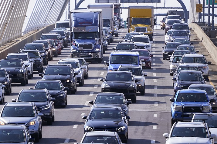 Automobile traffic jams Route 93 South, Wednesday, July 14, 2021, in Boston. More than 33 million people in the United States are driving vehicles that contain a potentially deadly threat: Airbag inflators that in rare cases can explode in a collision and spew shrapnel. (Charles Krupa/AP, File)
