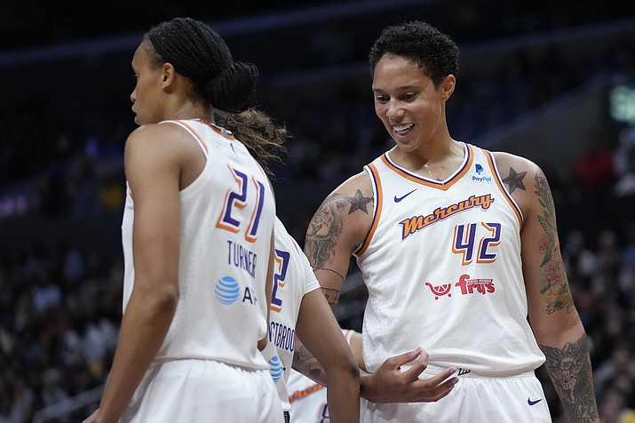 Phoenix Mercury center Brittney Griner (42) celebrates a foul with teammates during the first half of a game against the Los Angeles Sparks in Los Angeles, Friday, May 19, 2023. (Ashley Landis/AP)