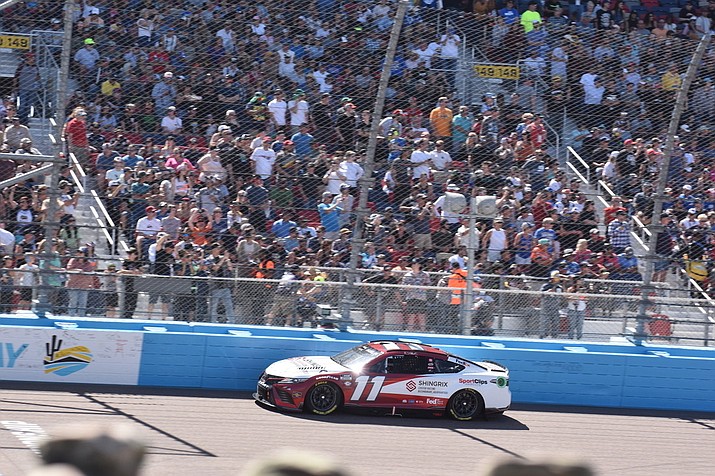 23XI Racing’s Denny Hamlin wrote another chapter of his rivalry with Ross Chastain when he intentionally wrecked rival Ross Chastain at Phoenix Raceway in March. (Joe Eigo/Cronkite News)