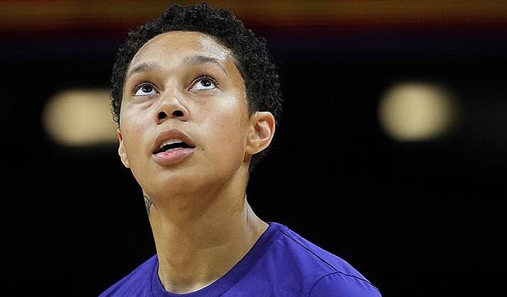 Phoenix Mercury center Brittney Griner warms up prior to a WNBA preseason basketball game against the Los Angeles Sparks, Friday, May 12, 2023, in Phoenix. (AP Photo/Matt York)