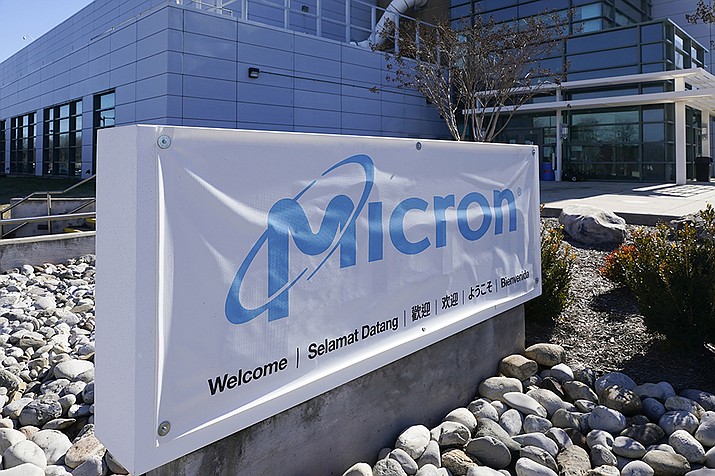 A sign marks the entrance of the Micron Technology automotive chip manufacturing plant on Feb. 11, 2022, in Manassas, Va. Stepping up a feud with Washington over technology and security, China's government on Sunday, May 21, 2023 told users of computer equipment deemed sensitive to stop buying products from the biggest U.S. memory chip maker, Micron Technology Inc. (Steve Helber, AP File)