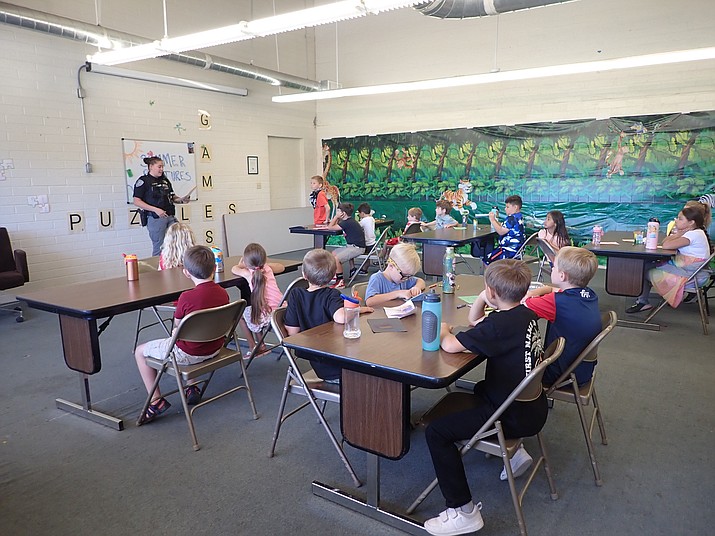 Guest speaker from the police department comes to speak at Camp Verde Summer Day Camp 2022 (Courtesy/ Shawna Figy)