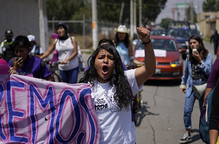 Roxana Ruiz shouts slogans during a march in memory of Diana Velazquez, who was making a call outside her home in 2017 when she was disappeared, raped and killed, in Chimalhuacan, State of Mexico, Mexico, July 2, 2022. Ruiz, who killed a man defending herself when he attacked and raped her in 2021 was sentenced to more than six years in prison, a decision her legal defense called “discriminatory” and vowed to appeal Tuesday, May 16, 2023. (Eduardo Verdugo/AP, File)