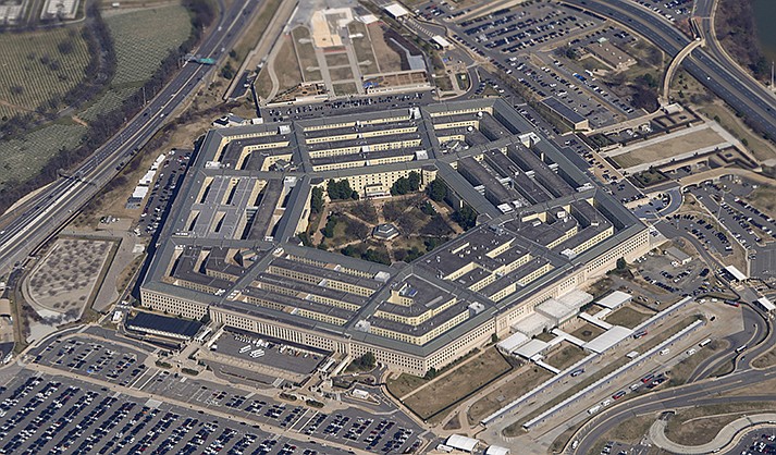 The Pentagon is seen from Air Force One as it flies over Washington, March 2, 2022. A fake image purportedly showing an explosion near the Pentagon has been widely shared on social media, sending a brief shiver through the stock market. But police and fire officials in Arlington, said Monday, May 22, 2023, that the image isn't real and there was no incident at the U.S. Department of Defense headquarters. (AP Photo/Patrick Semansky, File)