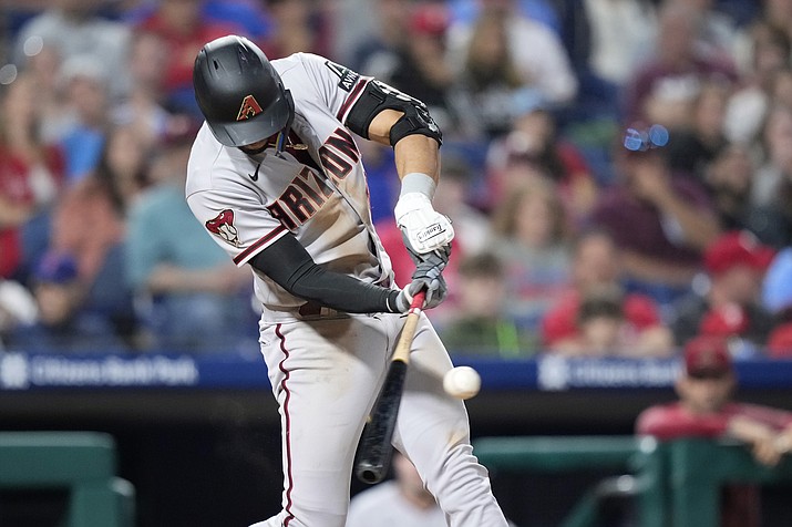 Arizona Diamondbacks' Lourdes Gurriel Jr. hits a run-scoring double against Philadelphia Phillies pitcher Jeff Hoffman during the eighth inning of a game, Monday, May 22, 2023, in Philadelphia. (Matt Slocum/AP)