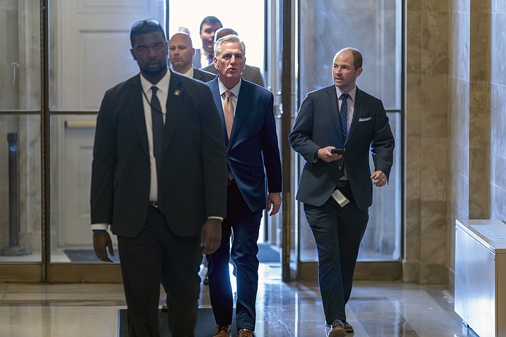 Speaker of the House Kevin McCarthy, R-Calif., returns after he spoke privately to his Republican colleagues, at the Capitol in Washington, Tuesday, May 23, 2023. (J. Scott Applewhite/AP)