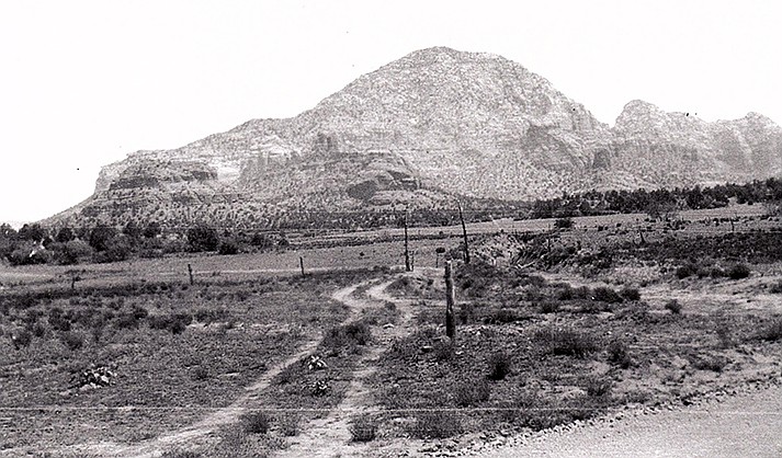 View of the old road onto Grasshopper Flats from the newly graveled County Road. “Rainbows End” was one of the first substantial buildings in the area that became West Sedona.