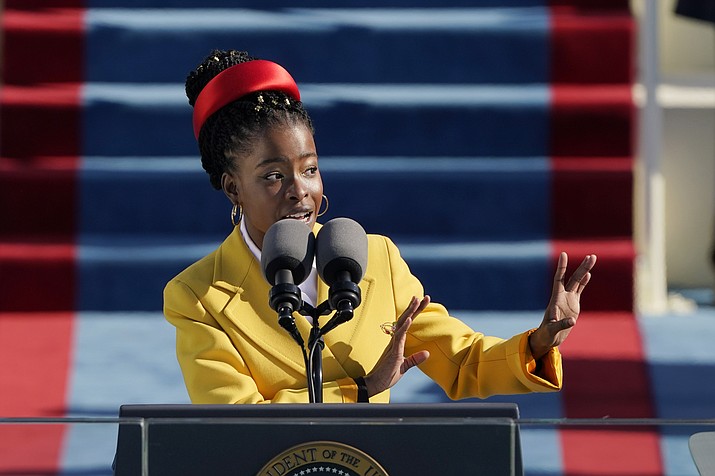 American poet Amanda Gorman recites a poem during the Inauguration of U.S. President Joe Biden at the U.S. Capitol on Jan. 20, 2021, in Washington. The poem written for Biden’s inauguration has been placed on a restricted list for elementary-aged students at a school in South Florida after a complaint by one parent. In a Facebook post on Tuesday, May 23, 2023, Gorman vowed to fight back. (Patrick Semansky/AP, File)