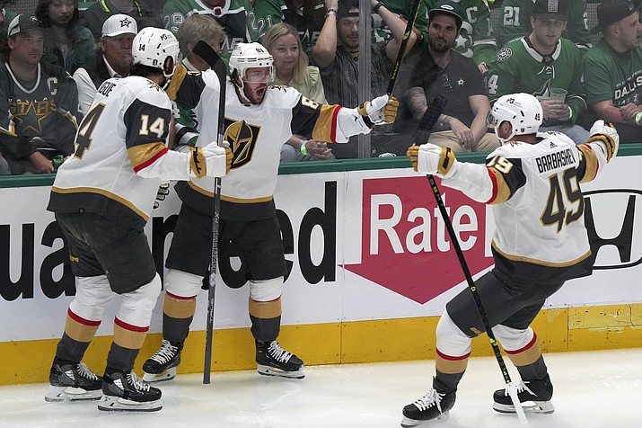 Vegas Golden Knights right wing Jonathan Marchessault (81) celebrates his goal against the Dallas Stars with Nicolas Hague and Ivan Barbashev (49) during the first period of Game 3 of the Stanley Cup Western Conference finals in Dallas, Tuesday, May 23, 2023. (LM Otero/AP)