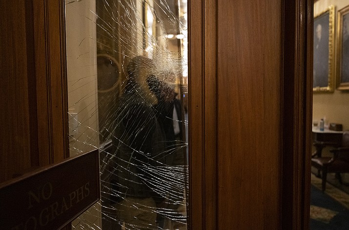 A shattered window in the Speakers Lobby off the House chamber in the U.S. Capitol on Jan. 6, 2021, hours after rioters left the building. (Photo by Benjamin Applebaum/Department of Homeland Security)